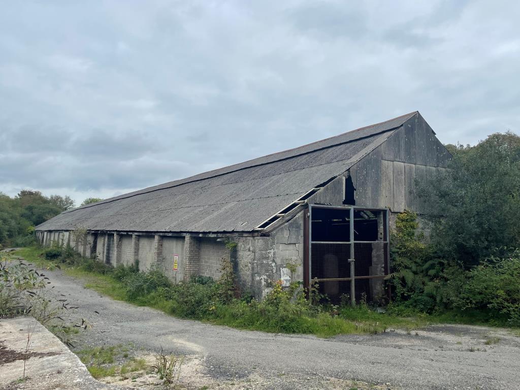 Lot: 4 - FREEHOLD SITE WITH STORE BUILDING AND CHIMNEY STACK - Substantial Building